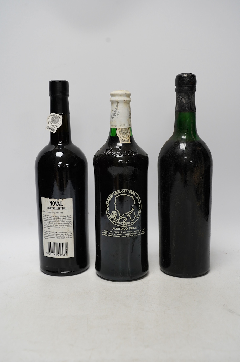 Three bottles of port to include a bottle of Niepoort’s Colheita port vintage 1978, a bottle of Noval 1991 LBV port and a bottle of Cockburns 1970 vintage port. Condition - fair, storage history unknown